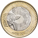 Реверс биметаллической монеты Колумбии: в центре морская черепаха логгерхед, заплывающая с левой стороны на серебристый диск. Стилизованные волны переходят из центра на золотистое внешнее кольцо. В нижней части кольца надпись TORTUGA CAGUAMA. По краю серебристой части текст AGUA (вода).