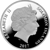 Аверс серебряной монеты Соломоновых Островов: в центре матовый профиль королевы Елизаветы II в тиаре. Слева по дуге надпись ELIZABETH II, справа SOLOMON ISLANDS. Снизу указан год чеканки 2017. Под портретом видны инициалы автора Иэна Рэнк-Бродли (IRB).